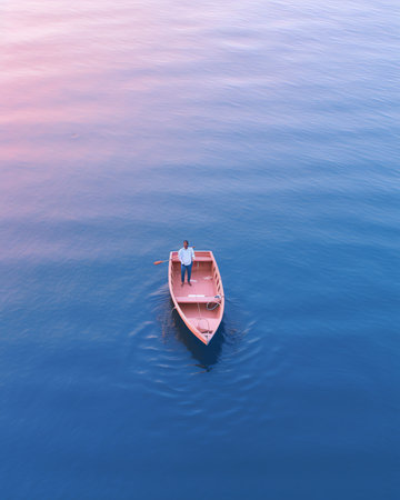 Generative AI : Aerial view of small fishing boats sailing along the lake coastline in Golyazi Merkez on Ulubat Lake Ulubat Golu Bursa Turkeyの素材