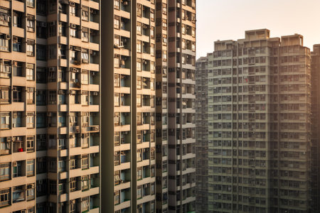Generative AI : Aerial view of high density residential buildings in Hong Kong Island at sunset Hong Kong Kowloon district Chinaの素材