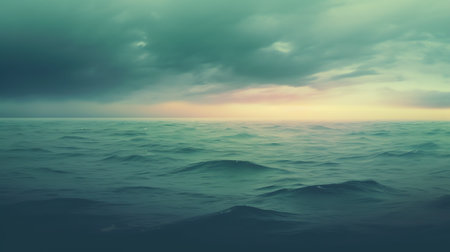 Generative AI : Blue green clouds over the sea Toned seascape Dark teal water and sky background with copy space for designRocky coastline on the horizon Creepy scary atmosphere moの素材