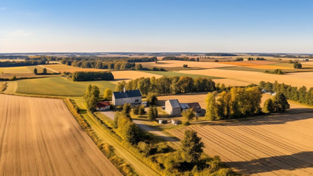 Generative AI : Panoramic natural landscape with green grass golden field of harvested wheat with bales and blue sky with clouds Colorful summer panorama of combination of yellow aの素材