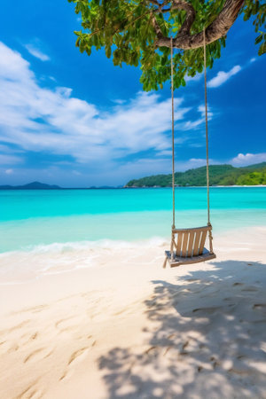 Generative AI : Beautiful natural tropical landscape beach with white sand and Palm tree with swing bridge going into distance Turquoise ocean on background blue sky with clouds onの素材