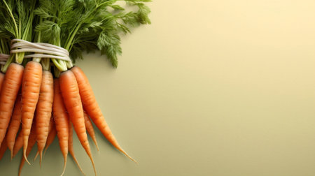 Generative AI : Bunch of fresh juicy carrots with greens is tied with yellow ribbon on light wooden backgroundの素材