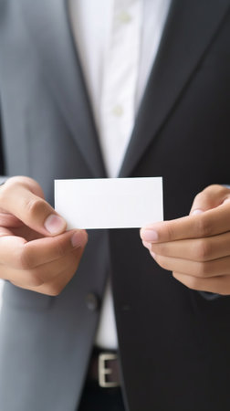 Generative AI : business man showing his business card on a white background  people business and lifesyle conceptの素材