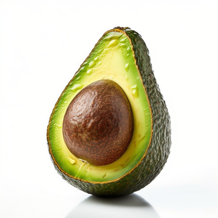 Generative AI : Freshly sliced avocado isolated on white backgroundの素材