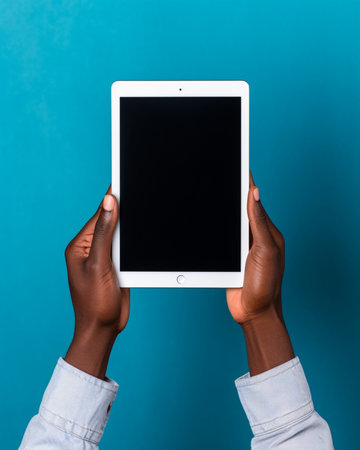 Generative AI : white tablet with a blank screen in the handsの素材