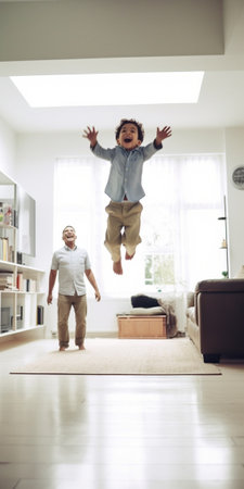 Generative AI : Cheerful young father holding up excited little boy while spending time together and having fun in light room at homeの素材