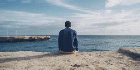 Generative AI : Man sitting on a wooden bench by the seaの素材