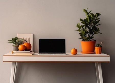 Generative AI : Laptop and oranges and orange juice and plant pot on white tableの素材