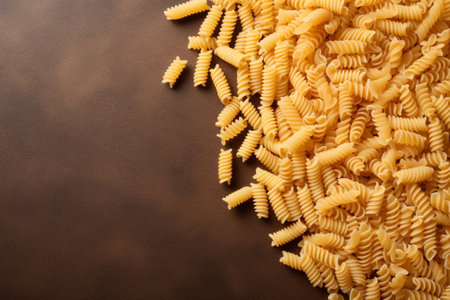 Generative AI : raw macaroni on wooden backgroundの素材