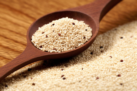 Generative AI : white quinoa grain in wooden spoonの素材