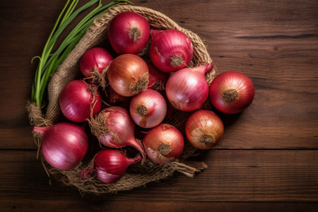 Generative AI : Red onion with fresh green sprouts on wooden backgroundの素材