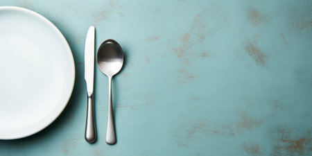 Generative AI : Blue plate bowls cup mug cutlery tableware Grey background Close up Top viewの素材