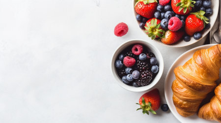 Generative AI : Croissant with fresh berries chocolate spread and butter with cup of coffee on a marble texture background Top viewの素材