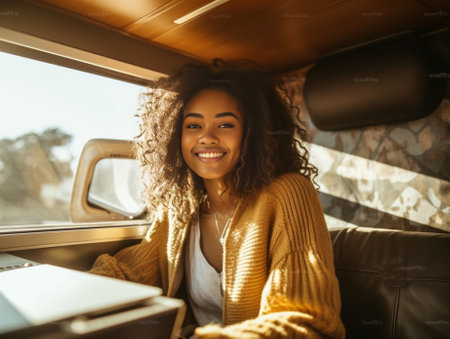 Enjoying the travel Attractive young woman looking out the vans window and smiling while sitting on the front passenger seat : Generative AIの素材