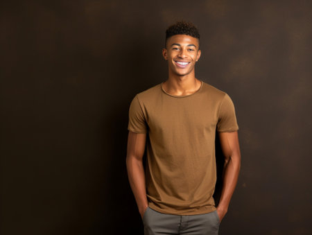 Fashionable young man keeping arms crossed and smiling while sitting against brown background : Generative AIの素材