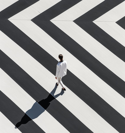 Top view of mature man in full suit carrying laptop while walking outdoors : Generative AIの素材