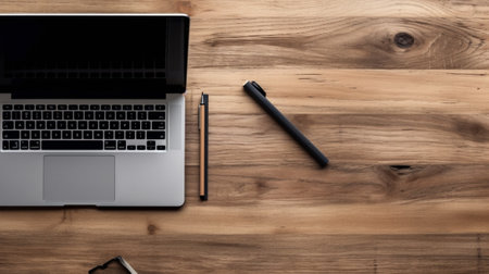 No people shot of creative workplace with laptop laying on the wooden desk : Generative AIの素材