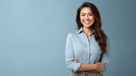 Young business professional Attractive young woman looking at camera and smiling while standing against grey background : Generative AIの素材