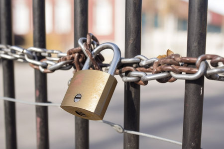 Chain with padlock locked iron gate house : Generative AIの素材