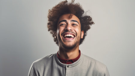 Horizontal shot of happy mixed race male with shining smile feels glad as recieves bonus and praise for good work has specific appearance Afro hairstyle dressed in fashio : Generative AIの素材