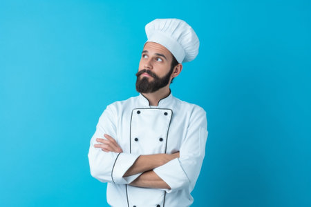 Indignant hesitant chef holds red sea bass cannot decide what to cook wears uniform black gloves tells about restaurant cuisine isolated on blue studio wall Cook prepares : Generative AIの素材