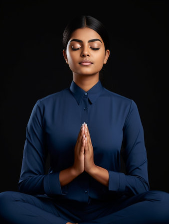 Mindful peaceful Afro American woman meditates indoor keeps hands in mudra gesture has eyes closed tries to relax after long hours of working holds fingers in yoga sign i : Generative AIの素材