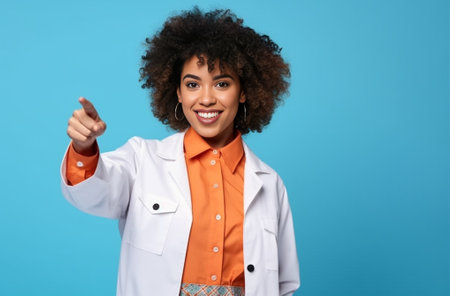 Photo of hesitant Afro American young lady shows palms demonstrates refusal sign rejects something has clueless expression curly bushy hairstyle isolated over blue backgr : Generative AIの素材