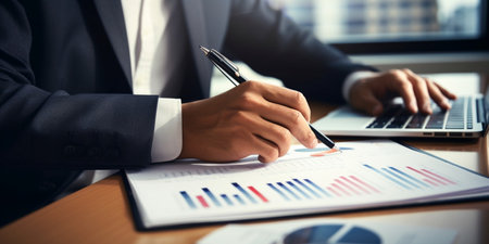 businessman working on project for analyzing company financial report balance statement with documents graphics at modern office space. Concept picture of business,econom : Generative AIの素材
