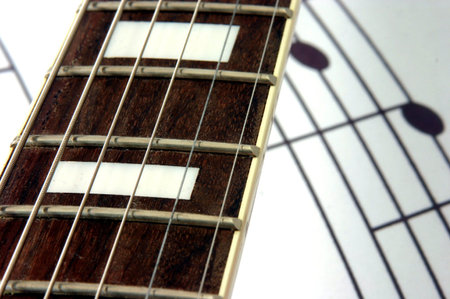 guitar neck and sheet music 2