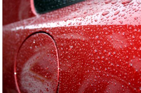 Detail of sports car with rain drops 2の写真素材