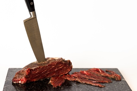 Fillet steak on chopping boardの写真素材