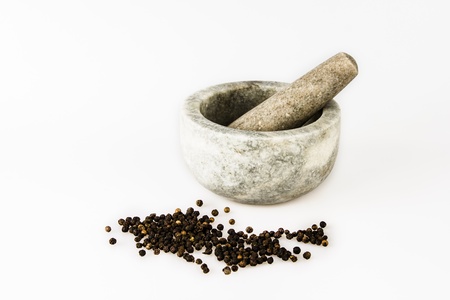 Pestle and mortar with peppercornsの写真素材