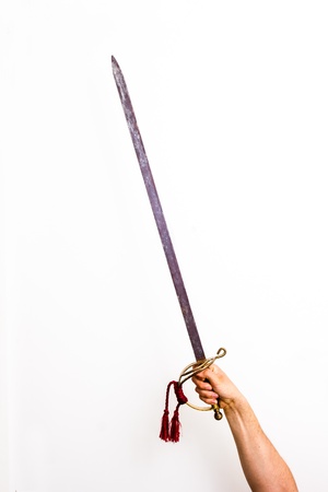 Hand holding traditional swordの写真素材
