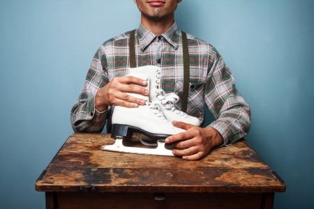 Park ranger at desk with hi ice skatesの写真素材