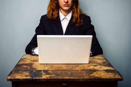 Business woman working on laptopの写真素材