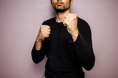 Young man in a boxer s stanceの写真素材