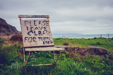 Old chair on the coastの写真素材