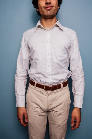 Happy young man dressed in whiteの写真素材