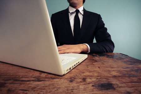 Businessman working on laptopの写真素材