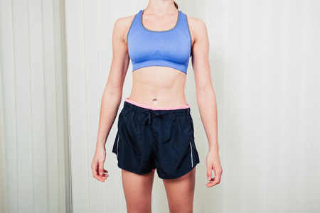 A fit and athletic young woman is wearing sportswearの写真素材