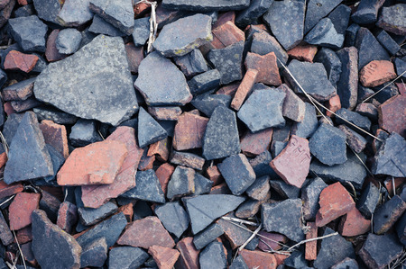 Rocks and rubble on the ground outsideの写真素材