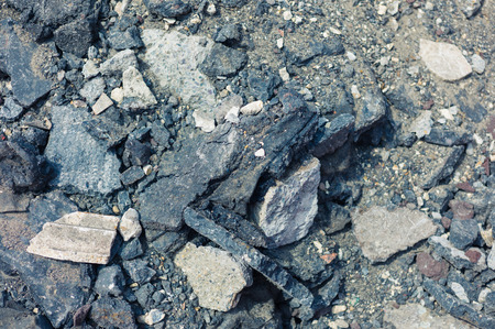 Rocks and rubble on the ground outsideの写真素材