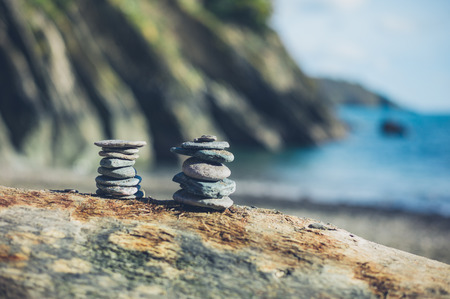 A bunch of small rocks placed in formation on the beachの写真素材