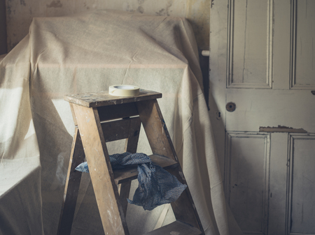 A stepladder in a room being painted and decoratedの写真素材