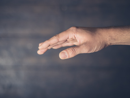 Overhead shot of a man offering a handshakeの写真素材