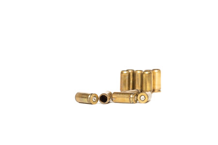 cartridge cases from pistol cartridges are isolated on a white background