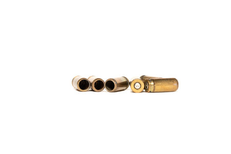 cartridge cases from pistol cartridges are isolated on a white backgroundの写真素材