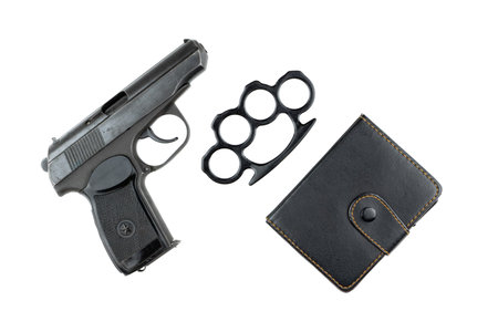 loaded Russian firearm, brass knuckles and notepad isolated on white backgroundの写真素材