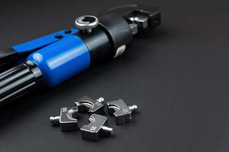 manual hydraulic press and dies for crimping tips on copper wiresの写真素材