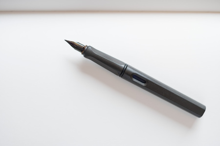 Fountain Pen, Notebook on wooden tableの写真素材